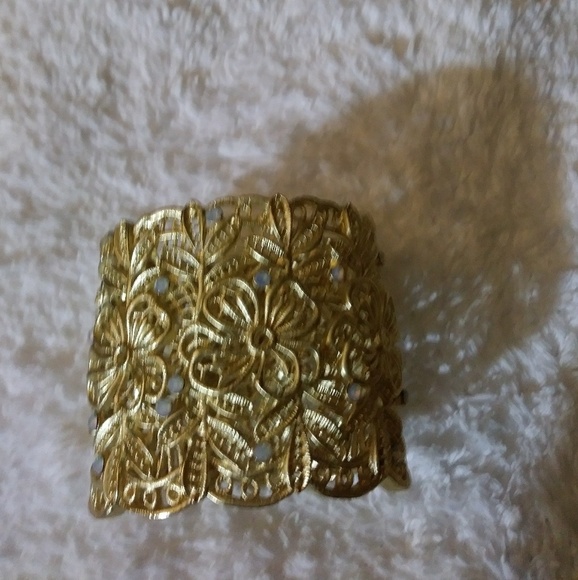 Gold tone wide hinged bracelet w/ stones - Picture 2 of 3